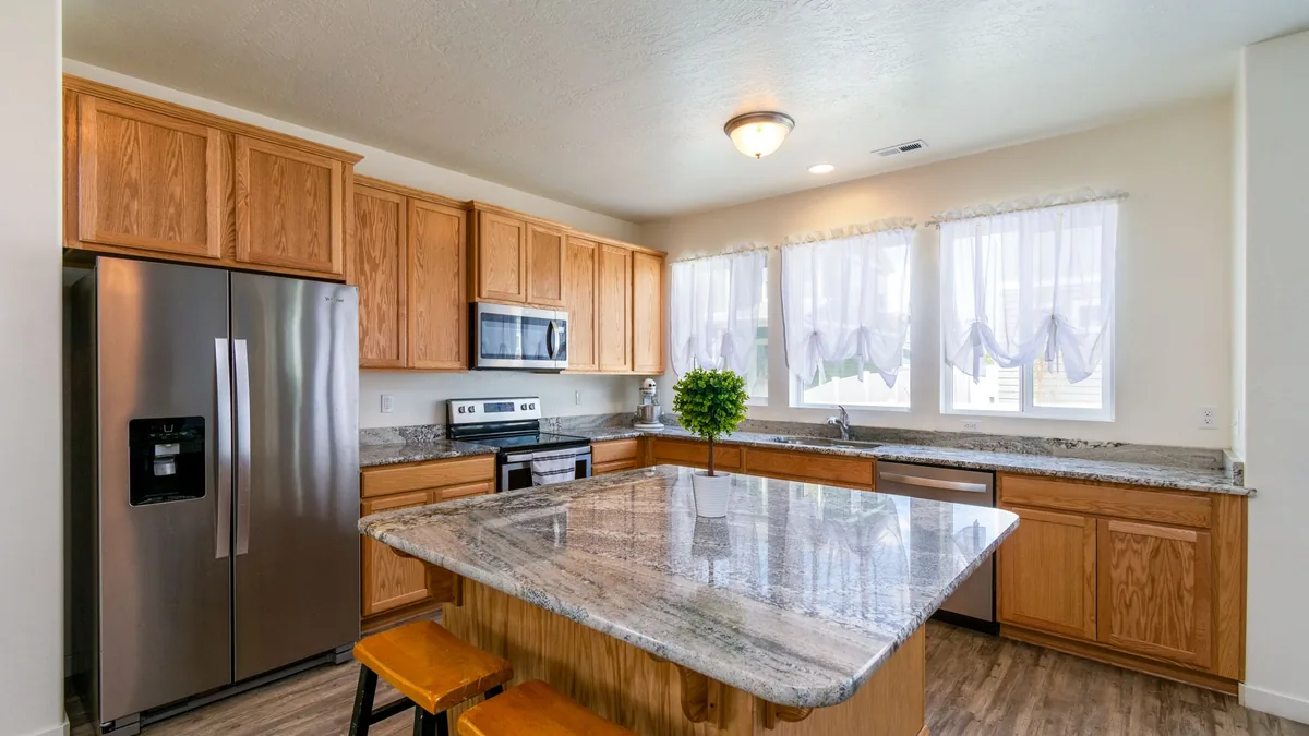 Finished kitchen with new cabinets and counters in a Sunnyvale, CA home