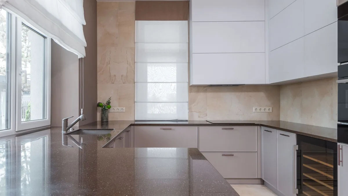 Stone countertop being installed on new kitchen cabinets in Sunnyvale, CA