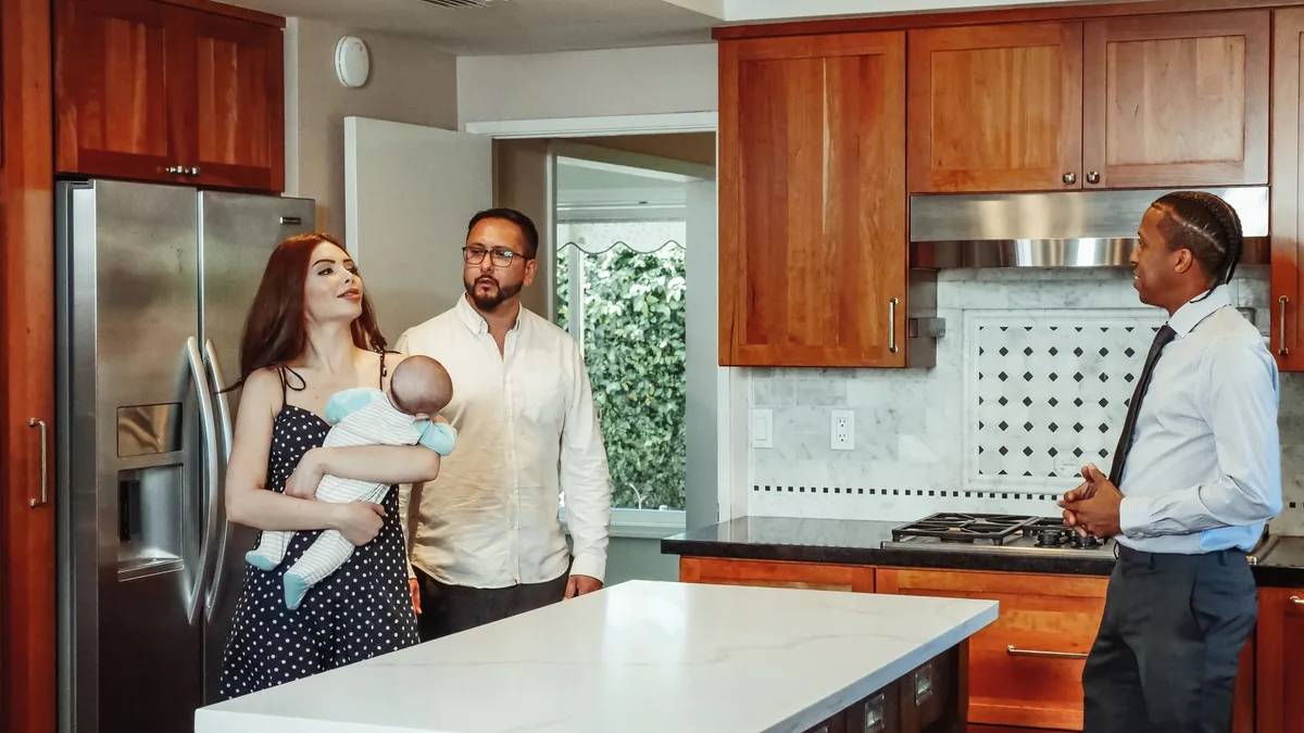 Contractor reviewing kitchen plans with a Sunnyvale, CA homeowner